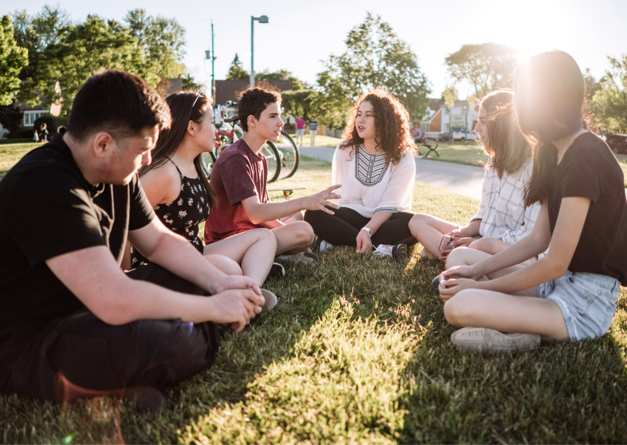 Image of teens talking in a group